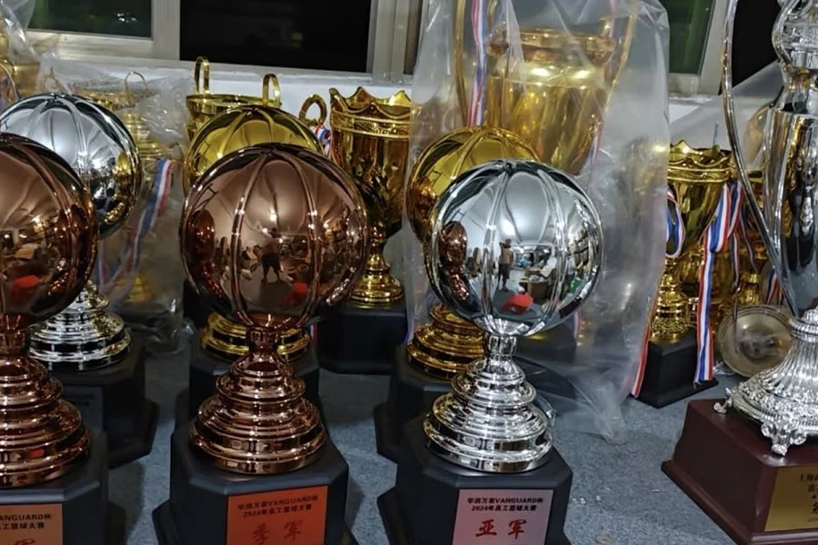 Gold, silver and bronze basketball trophies
