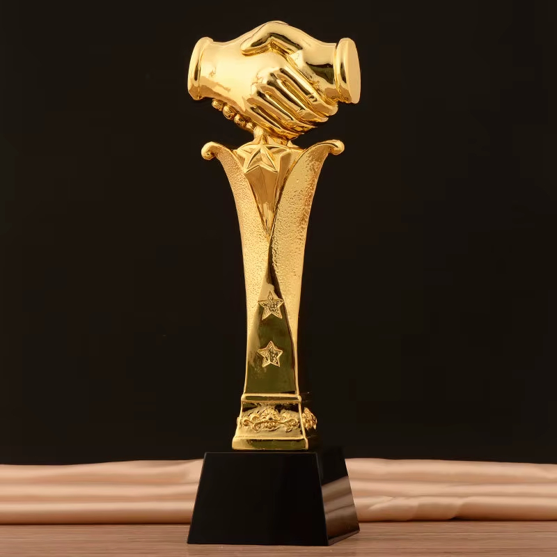 Outstanding employee handshake trophy1