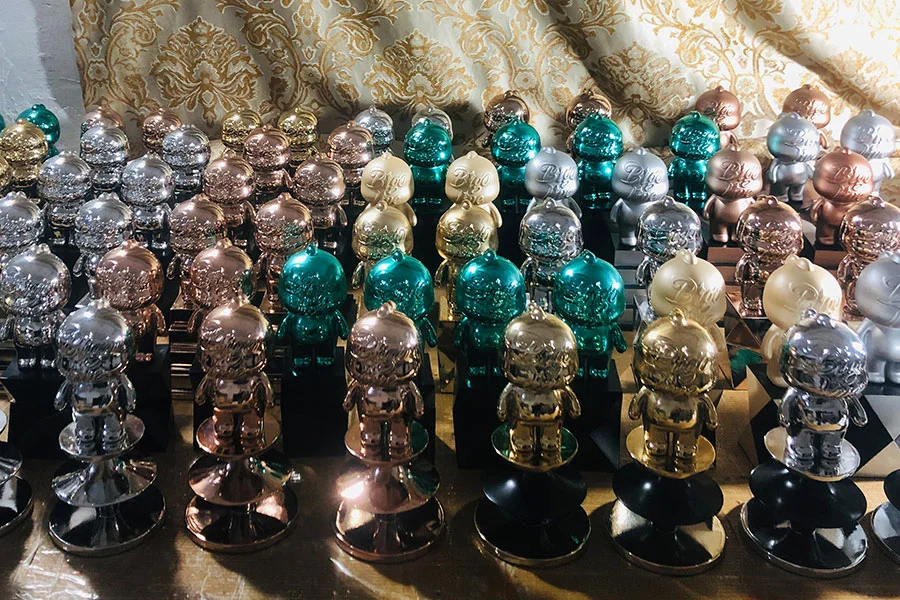 Doll logo trophy award